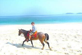 Montar a caballo en la playa